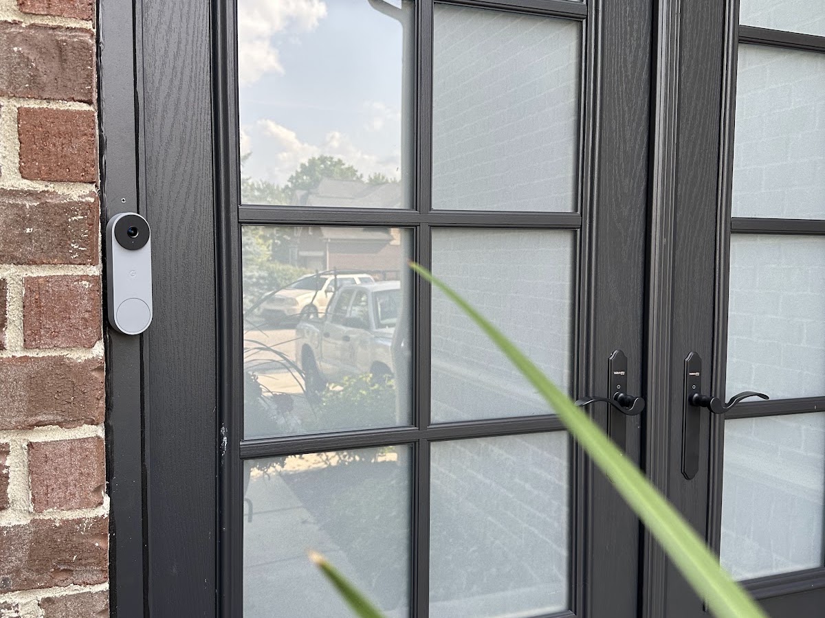 Smart video doorbell and lock installed on a home's front entry door